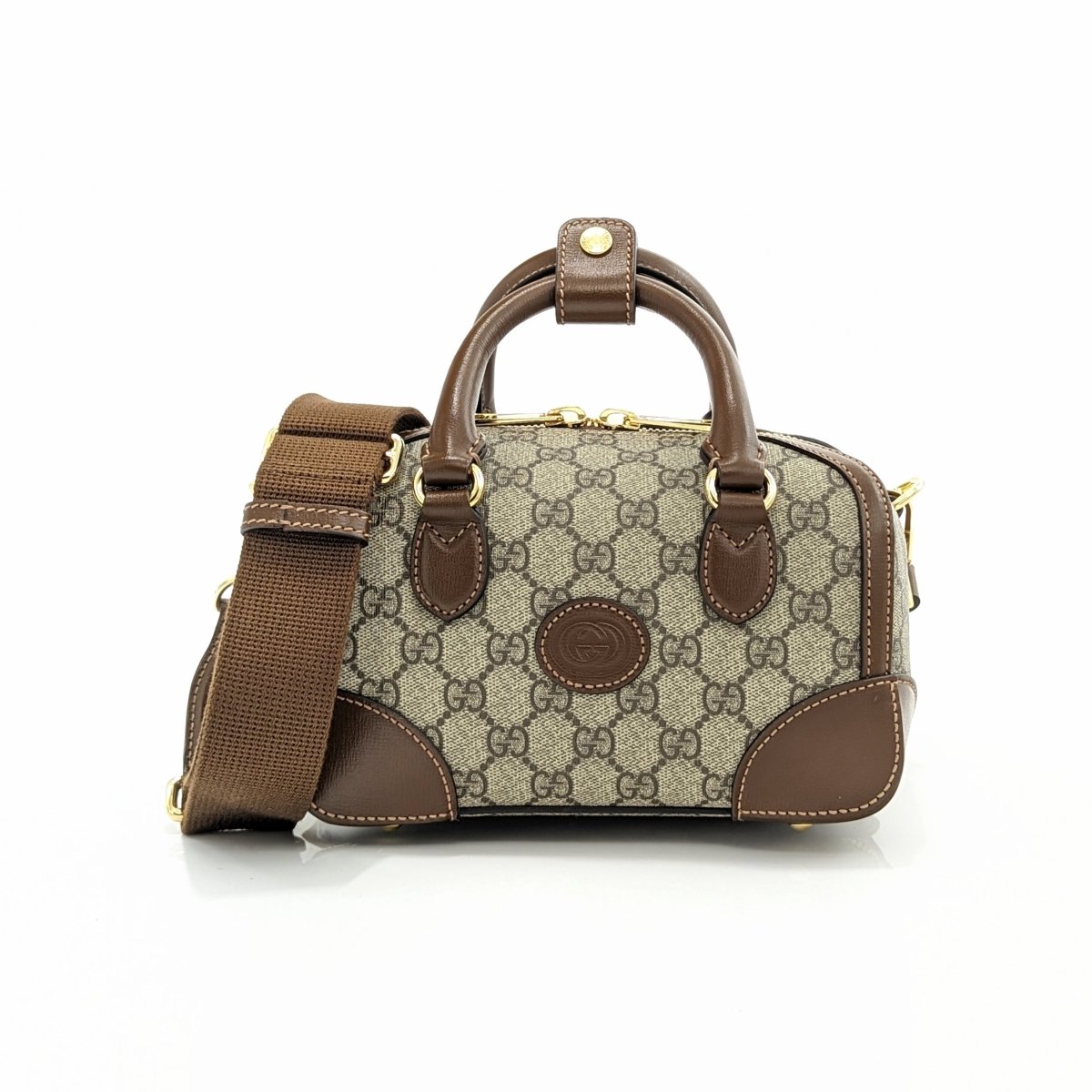 Mini bag with Interlocking G in GG supreme and brown leather